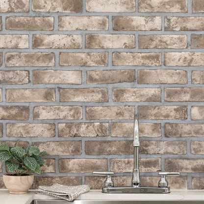 BrickStaks Doverton Gray 2.25x7.5 Brick Clay Mosaic installed in a finished room