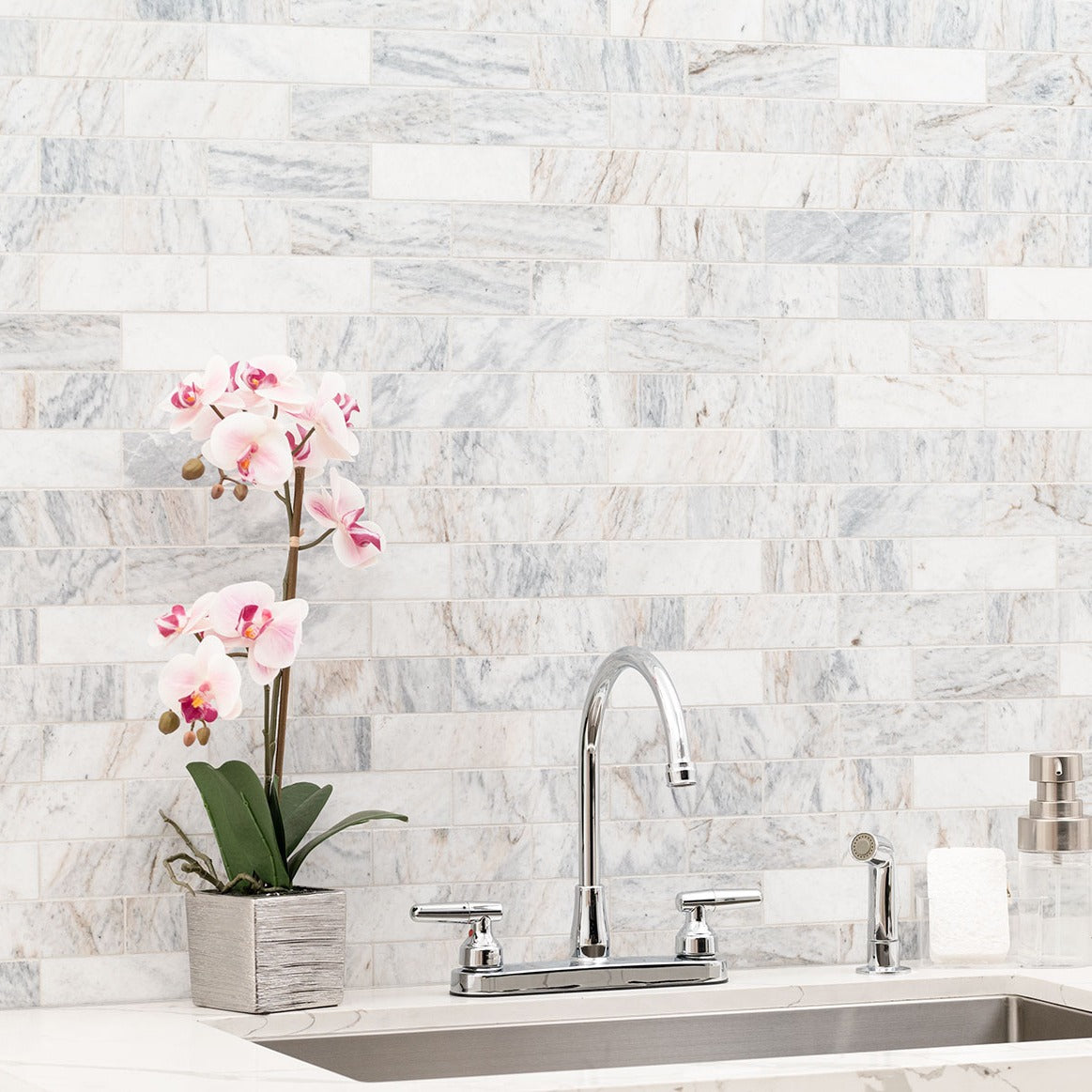 Capri Blue 2x6 Subway Marble Mosaic installed in a finished room