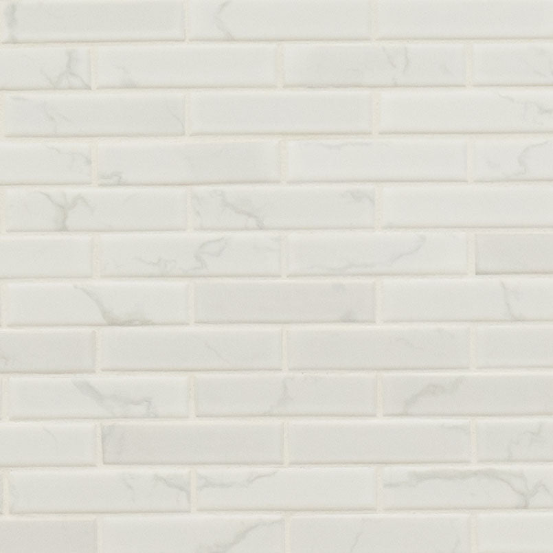 Carrara 1x4 Porcelain Mosaic in matte finish, close up sheet view