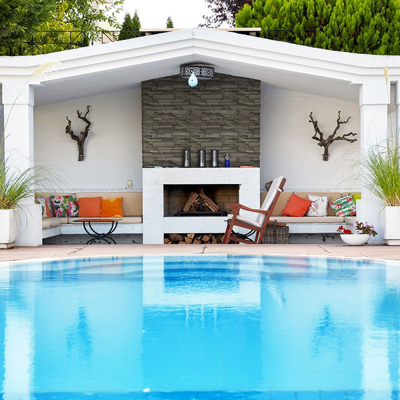 Copen Ash Terrado Manufactured Stone Decorative Wall Panels shown installed in a finished outdoor or living space