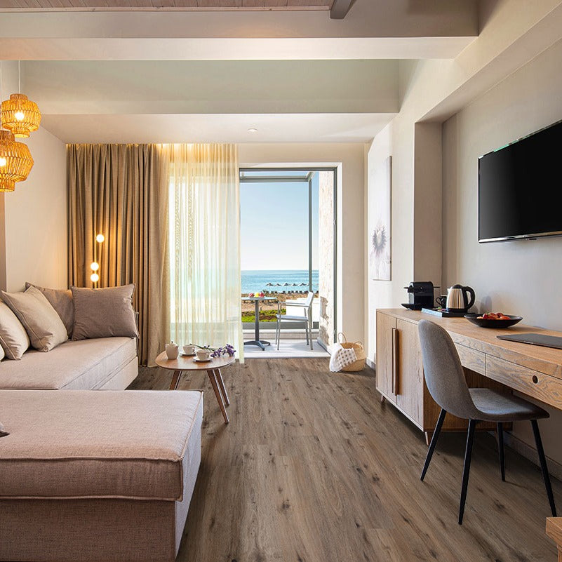 Cyrus 2.0 Fauna rigid core SPC vinyl plank flooring installed in a furnished room