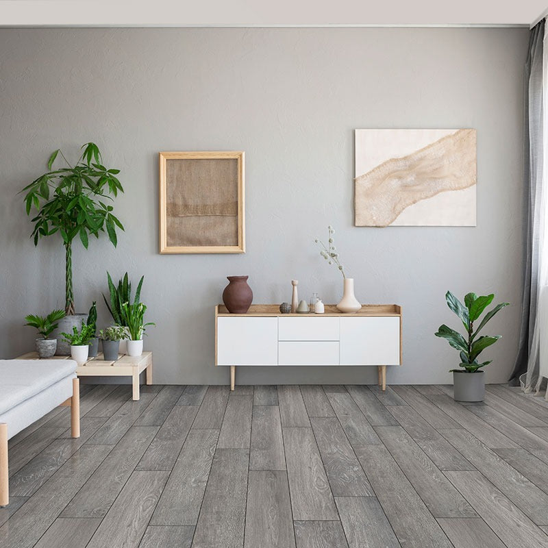 Cyrus Finely rigid core SPC vinyl plank flooring installed in a furnished room