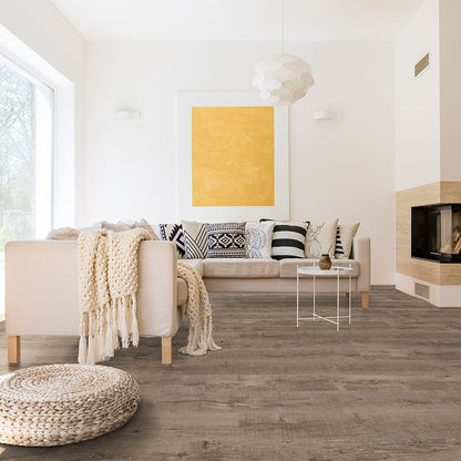 Cyrus Ryder rigid core SPC vinyl plank flooring installed in a furnished room