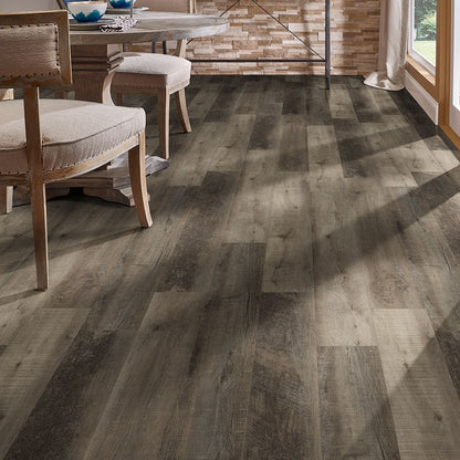 Cyrus Wolfeboro rigid core SPC vinyl plank flooring installed in a furnished room