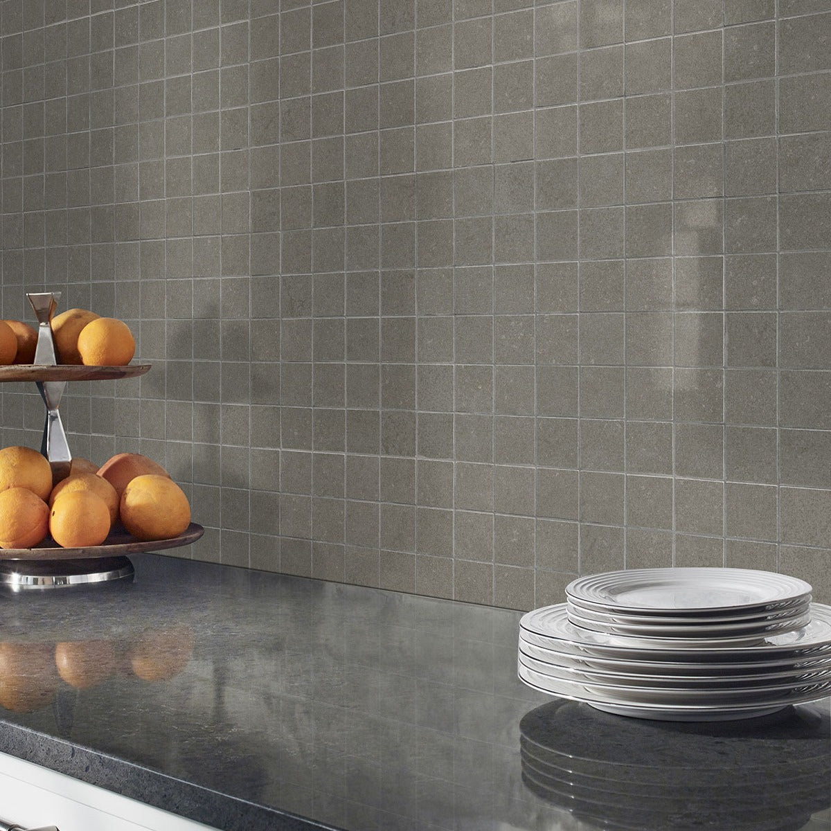 Dimensions Gris porcelain tile installed in a kitchen setting