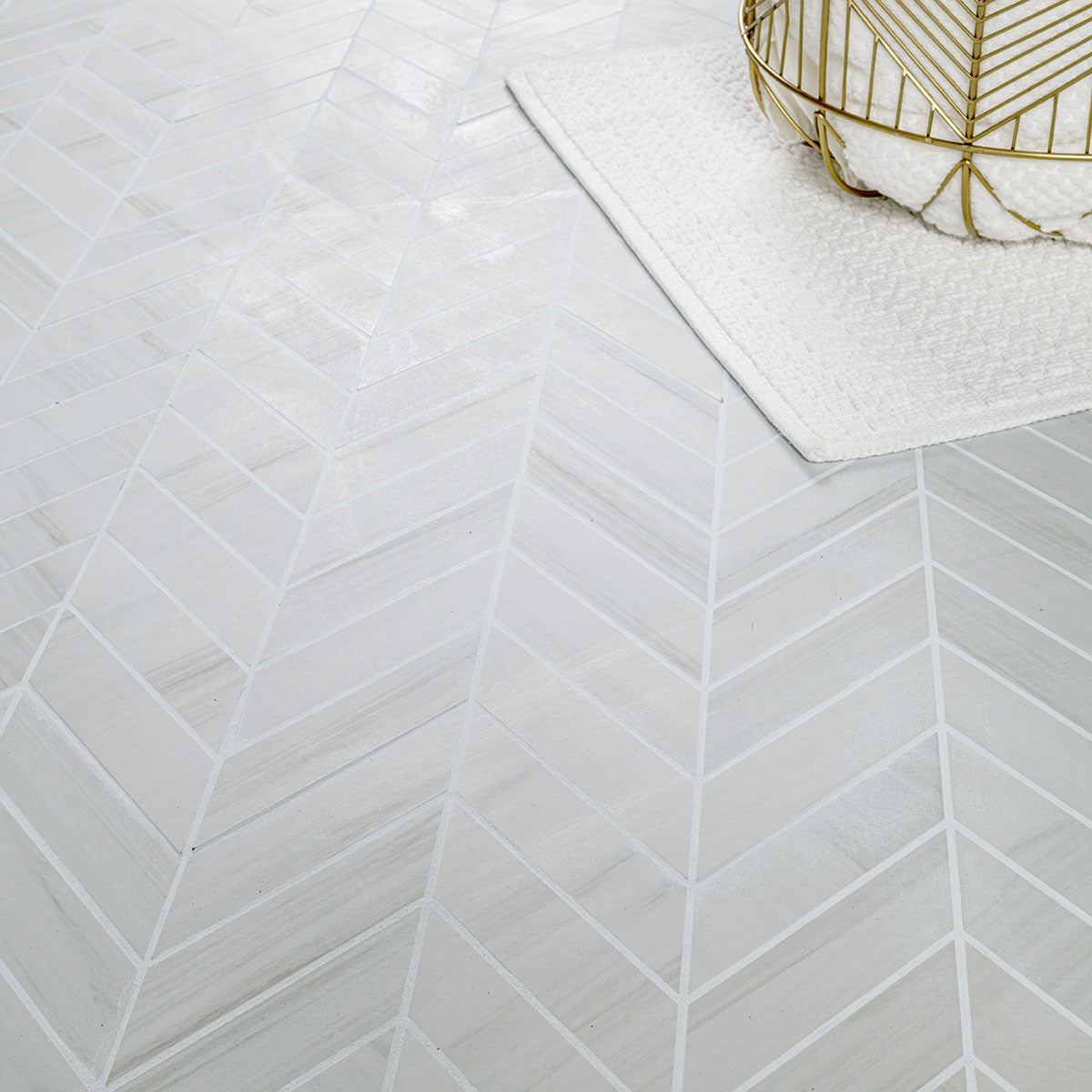 Eden Dolomite 12x15 Chevron Porcelain Mosaic installed in a finished room