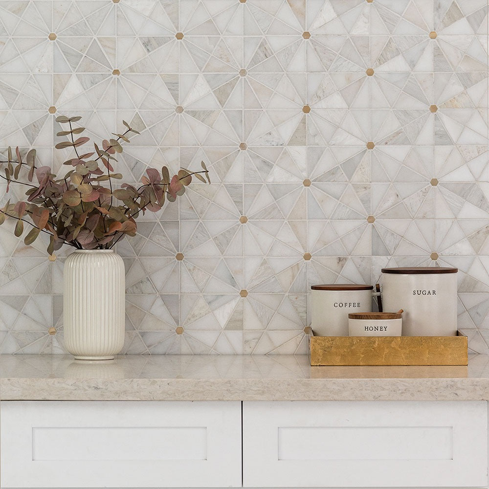 Elegante Pinwheel Gold Stone and Metal Mosaic installed in a finished room