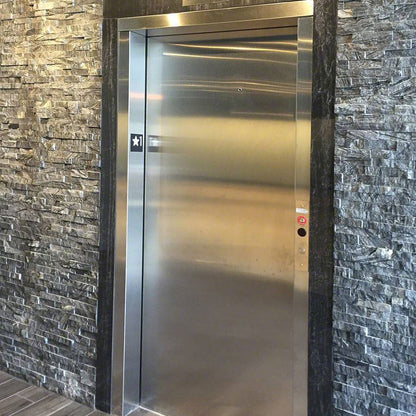 Glacial Black Rockmount Stacked Stone Decorative Wall Panels shown installed in a finished outdoor or living space