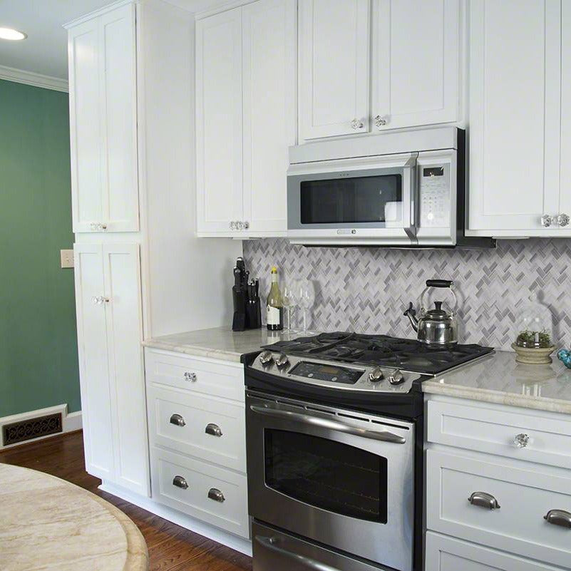 Greecian White Herringbone Marble Mosaic installed in a finished room