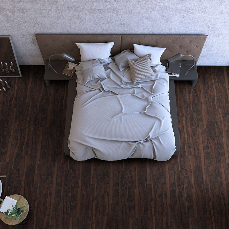 Katavia Burnished Acacia glue down vinyl plank flooring installed in a furnished room