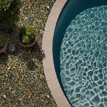 Mixed Polished Pebbles shown installed in a finished outdoor or living space