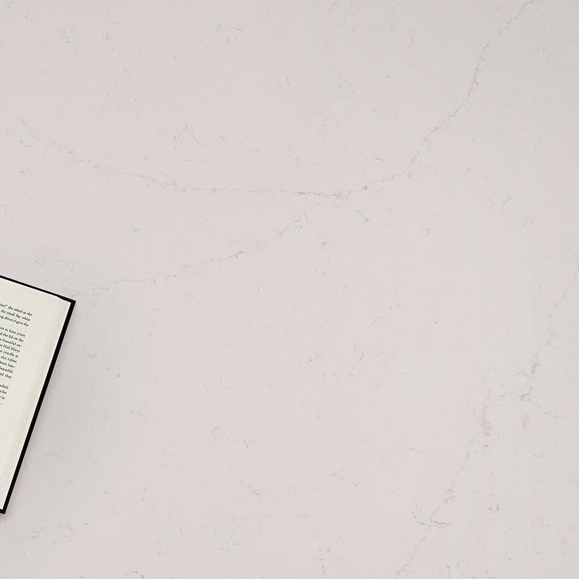 Alabaster White quartz countertop installed in a room setting