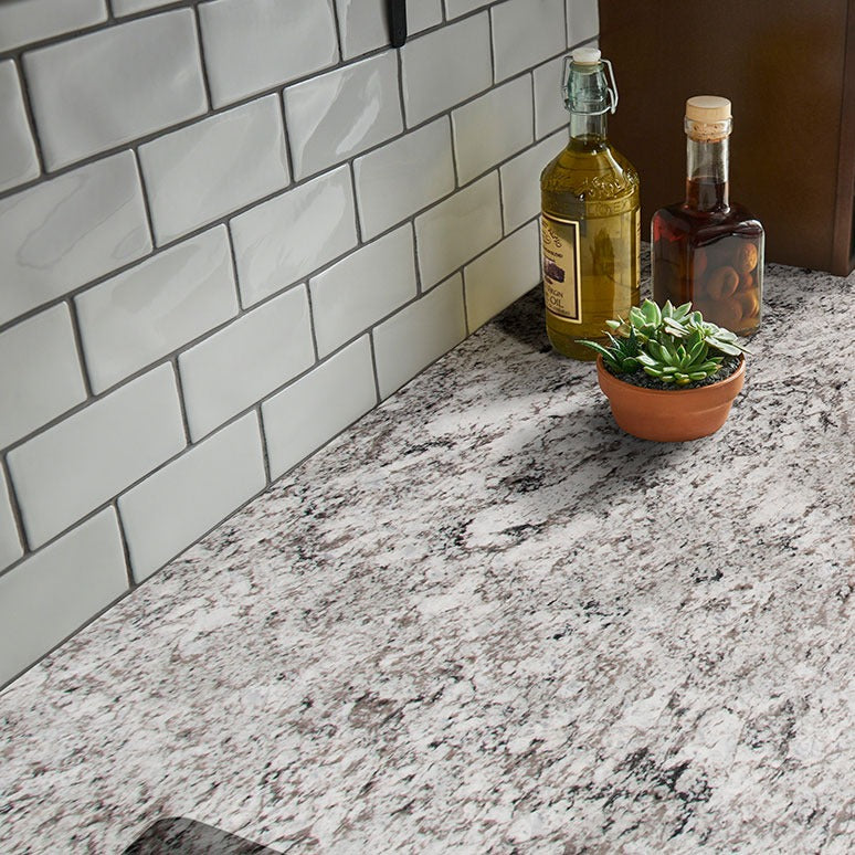 Avalon White granite countertop installed in a kitchen