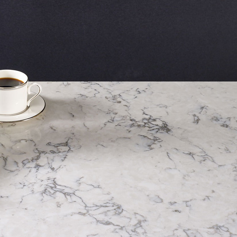 Blanca Arabescato LumaLuxe quartz kitchen countertop installed in a room setting