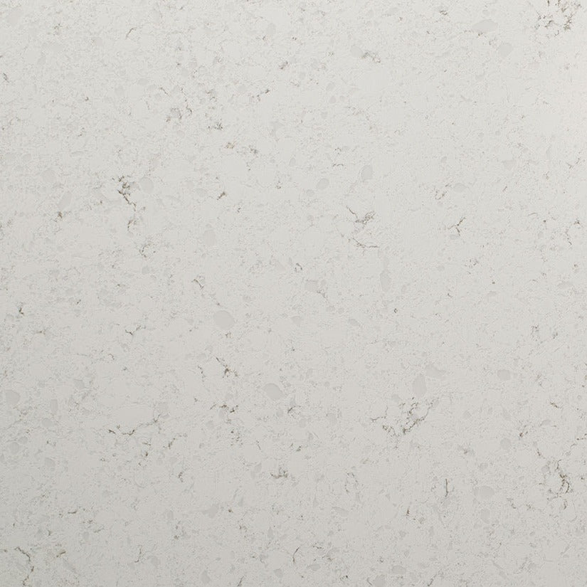 Blanca Statuarietto LumaLuxe quartz kitchen countertop installed in a room setting