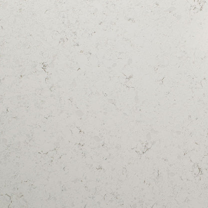 Blanca Statuarietto LumaLuxe quartz kitchen countertop installed in a room setting