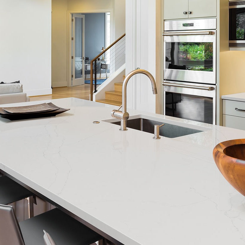 Calacatta Alto quartz countertop installed in a room setting