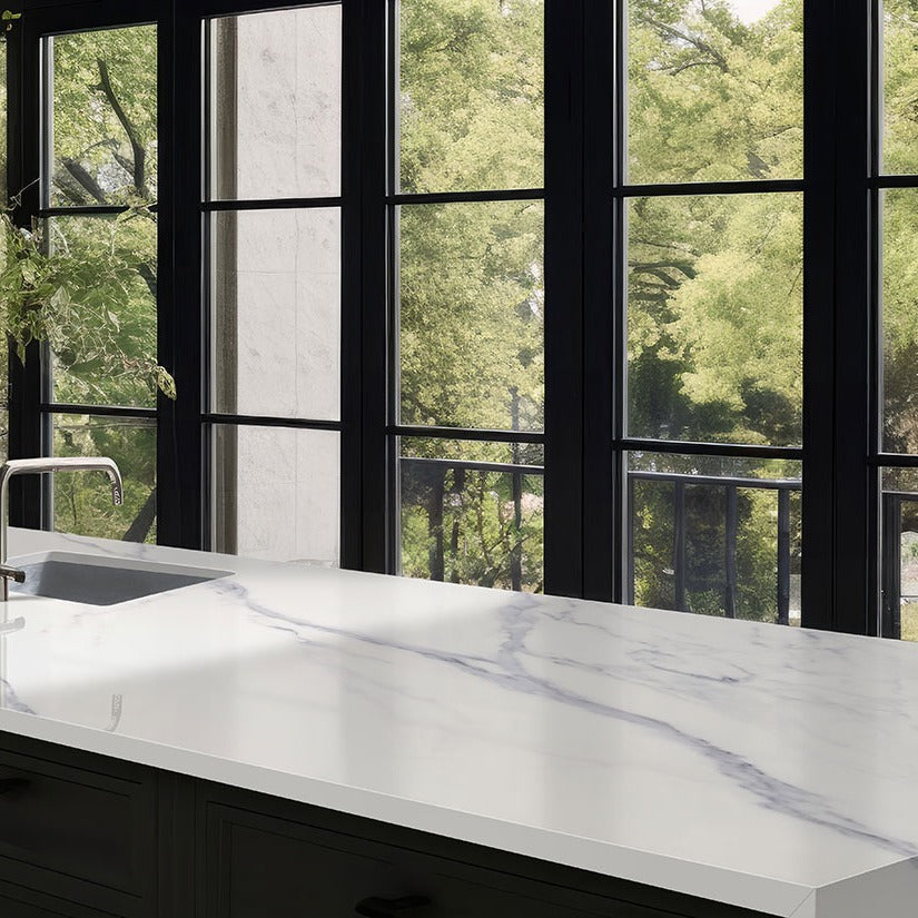 Calacatta Anava Q Plus quartz kitchen countertop installed in a room setting