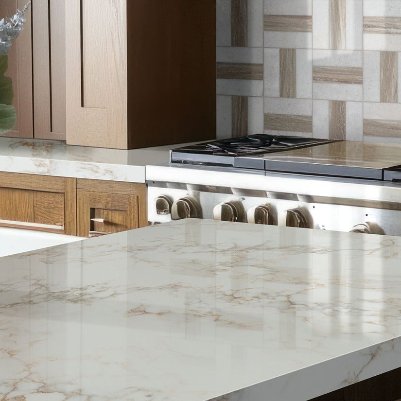 Calacatta Cinela LumaLuxe quartz kitchen countertop installed in a room setting