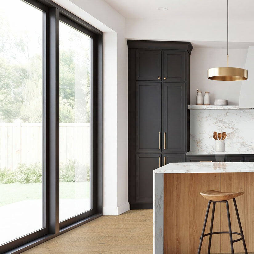 Calacatta Cinela LumaLuxe quartz kitchen countertop installed in a room setting