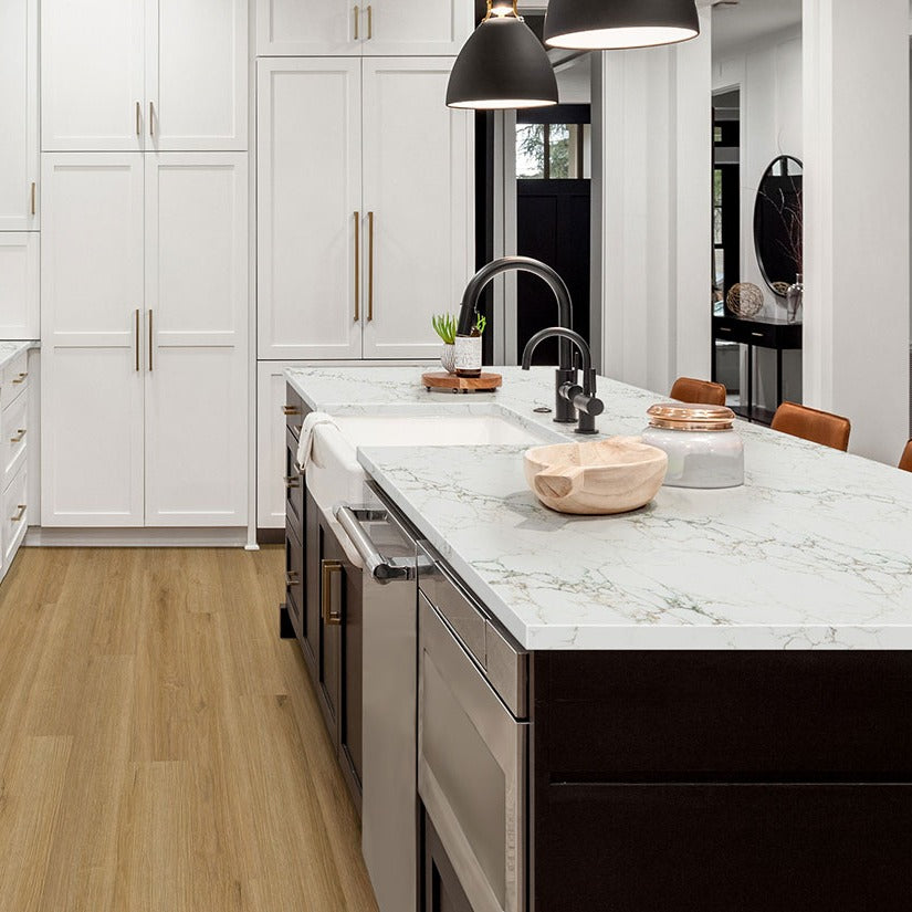 Calacatta Jadira quartz kitchen countertop installed in a room setting