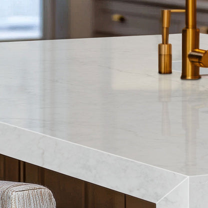 Calacatta Miraggio Lusso LumaLuxe Ultra quartz kitchen countertop installed in a room setting