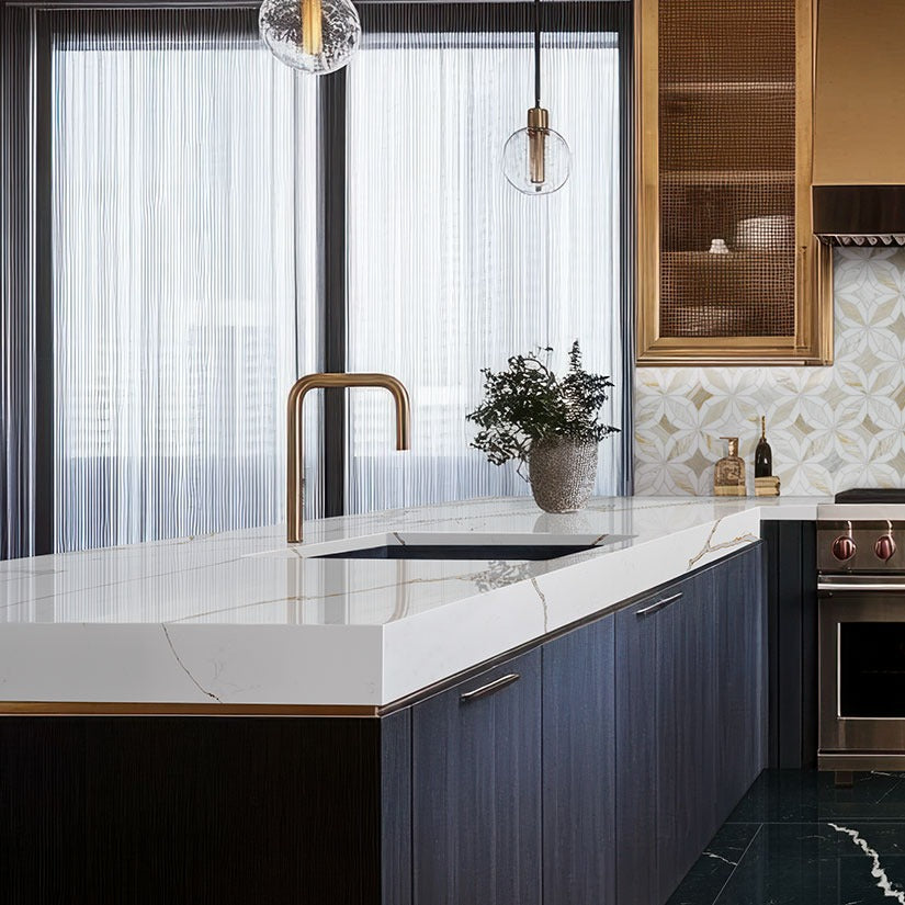 Calacatta Solessio LumaLuxe quartz kitchen countertop installed in a room setting