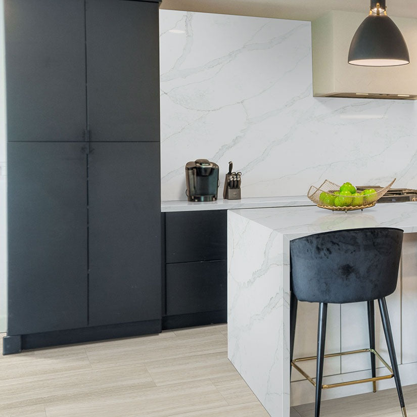 Calacatta Vernello quartz kitchen countertop installed in a room setting