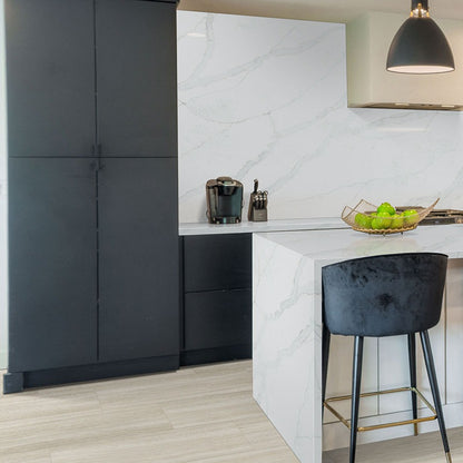 Calacatta Vernello quartz kitchen countertop installed in a room setting
