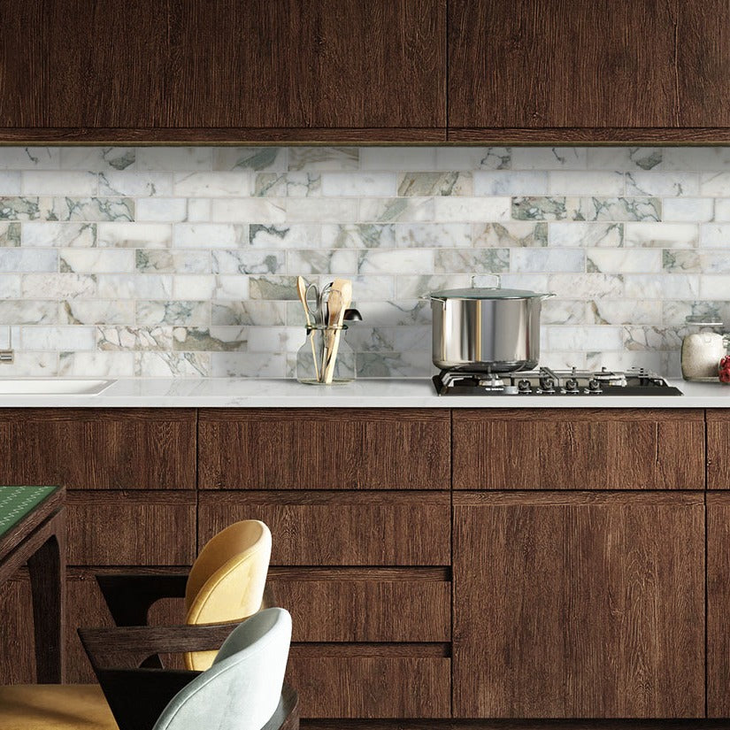 Calacatta Vernello quartz kitchen countertop installed in a room setting