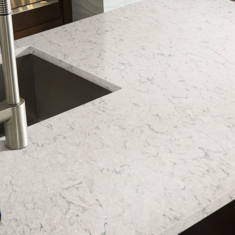 Carrara Mist quartz countertop installed in a room setting