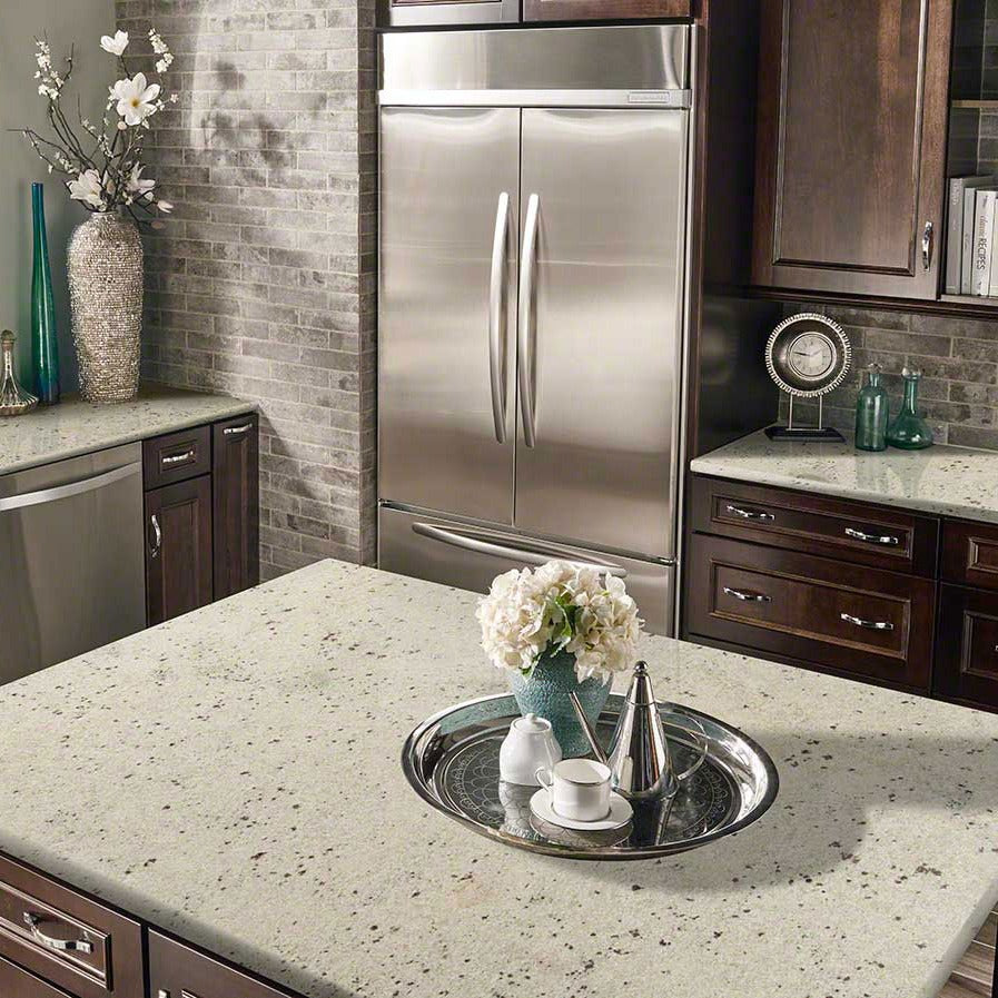Colonial White granite countertop installed in a kitchen
