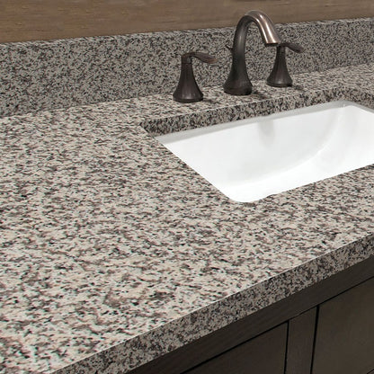 Crema Atlantico granite countertop installed in a bathroom