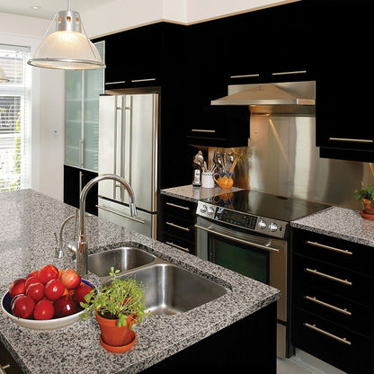 Crema Atlantico granite countertop installed in a kitchen