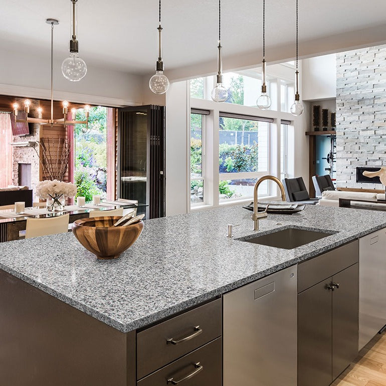 Luna Pearl granite countertop installed in a kitchen