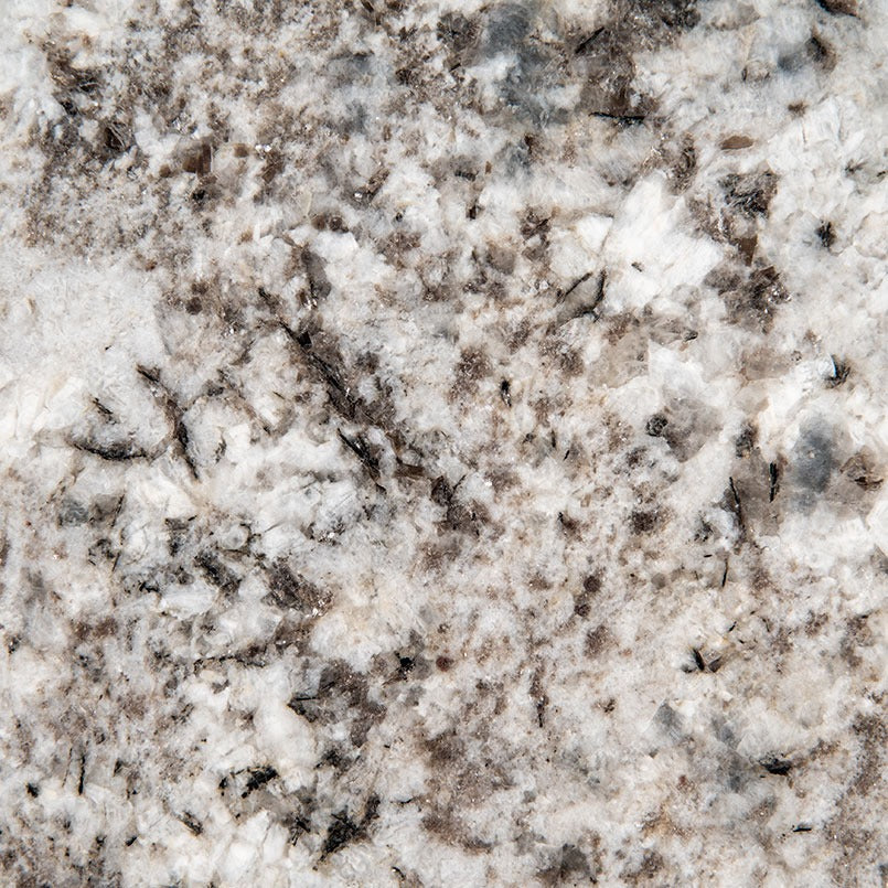 Mirage White granite slab, close up of the surface