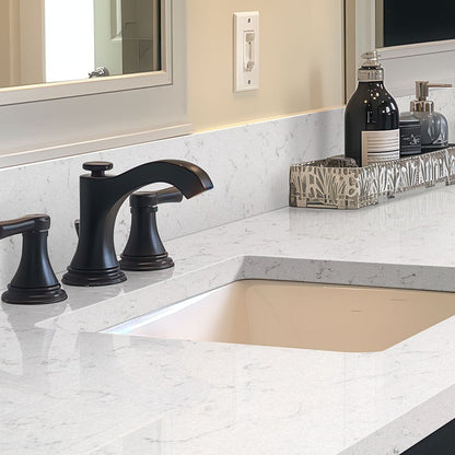 New Carrara Marmi quartz countertop installed in a room setting