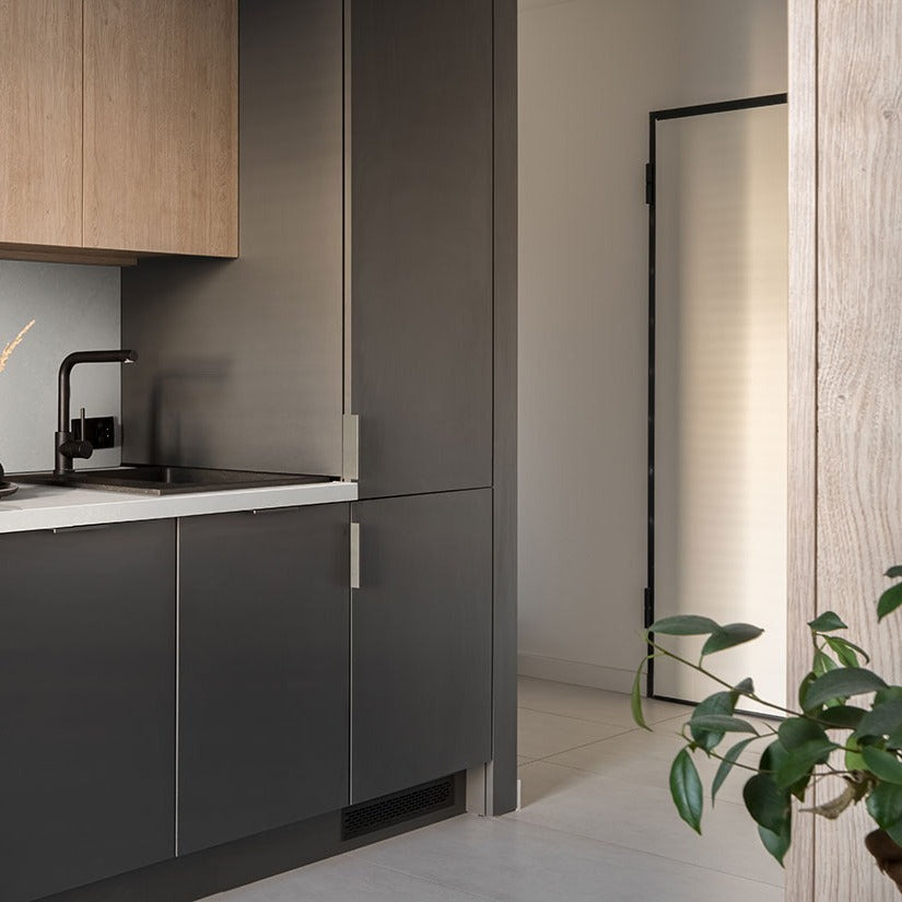 Perla White LumaLuxe quartz kitchen countertop installed in a room setting