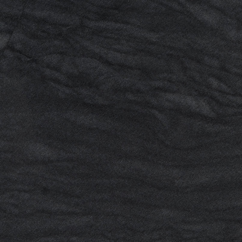 Platinum Black quartzite slab, close up of the stone surface