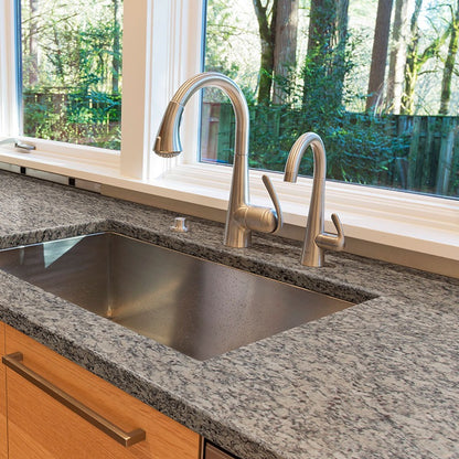 Santa Cecilia LC granite countertop installed in a kitchen