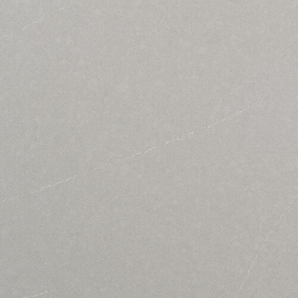 Soapstone Mist Concrete quartz slab, close up of the surface