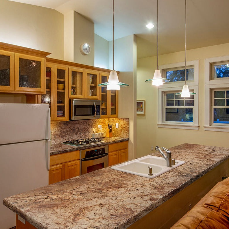 Typhoon Bordeaux granite countertop installed in a kitchen