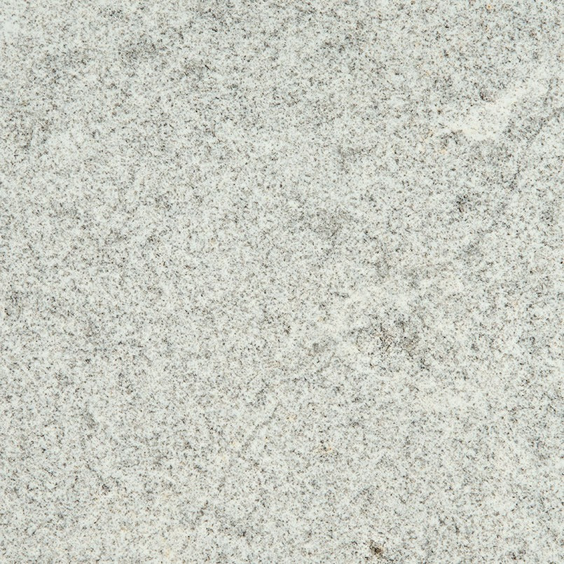 White Alpha granite slab, close up of the surface