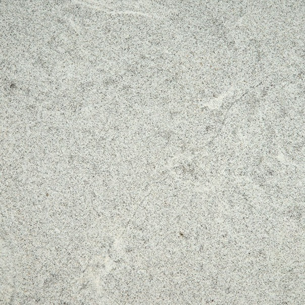 White Alpha granite slab, wider view of the stone pattern