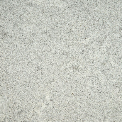 White Alpha granite slab, wider view of the stone pattern