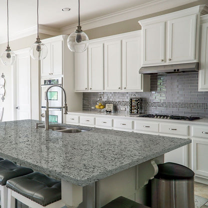 White Napoli granite countertop installed in a kitchen