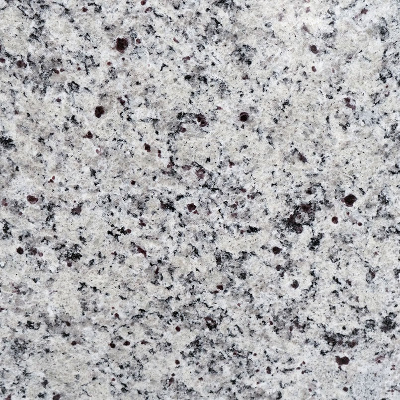 White Napoli granite slab, close up of the surface