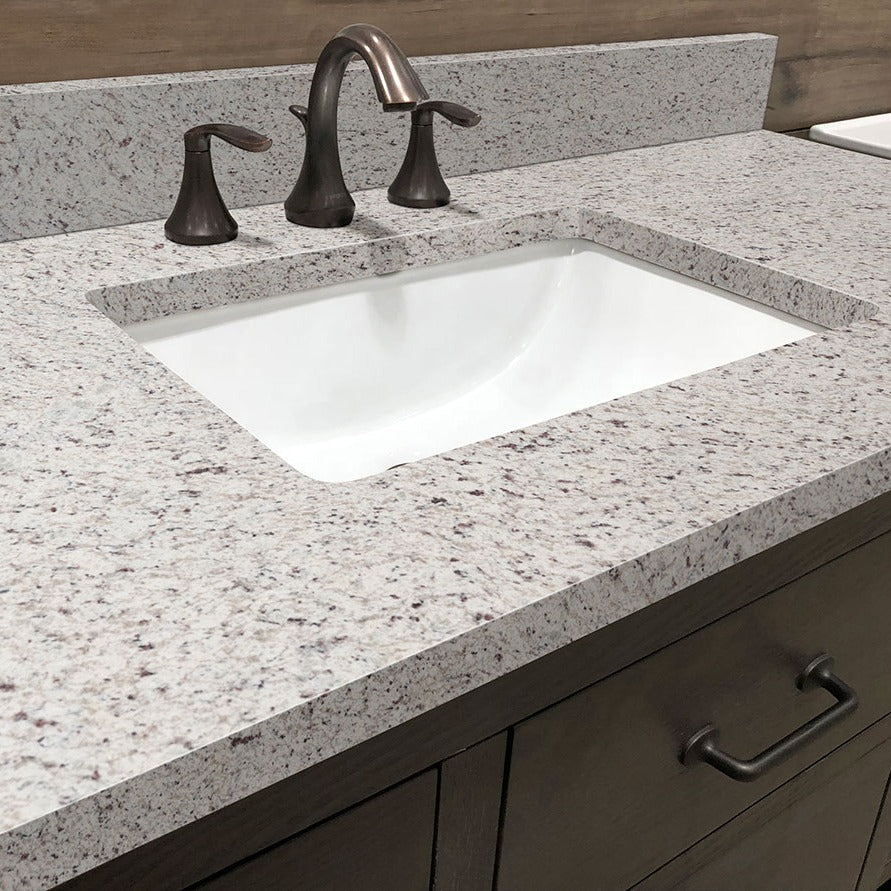 White Ornamental granite countertop installed in a bathroom