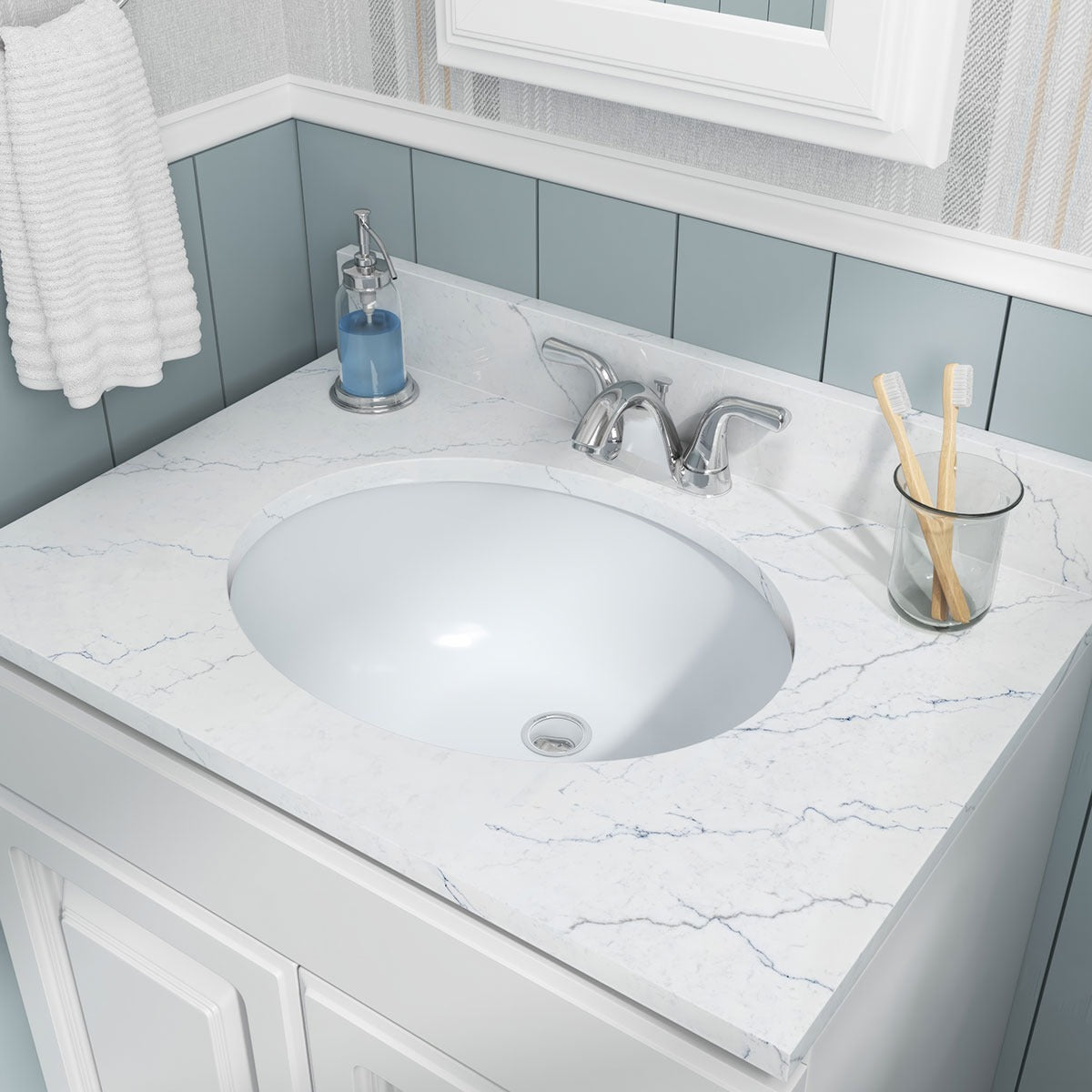 Oval 20" x 16" Porcelain Undermount Bathroom Sink in White, installed in a room setting