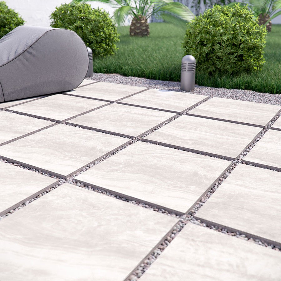 Praia Grey Arterra Porcelain Pavers shown installed in a finished outdoor or living space